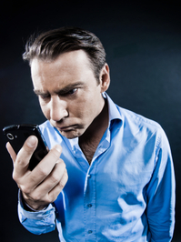 Angry man with cellphone