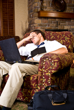 Man with laptop working late