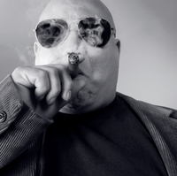 Big guy with cigar iStock_000004607261XSmall.jpg